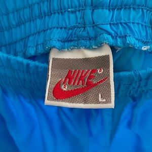NIKE L blue wind breaker pants